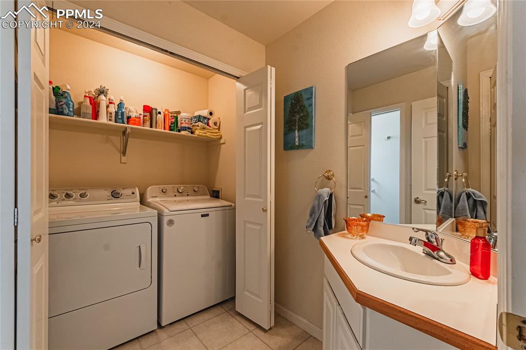 5148 Peak Villa Heights Colorado Springs, CO 80917 - Photo 26 of 45 Main level laundry closet