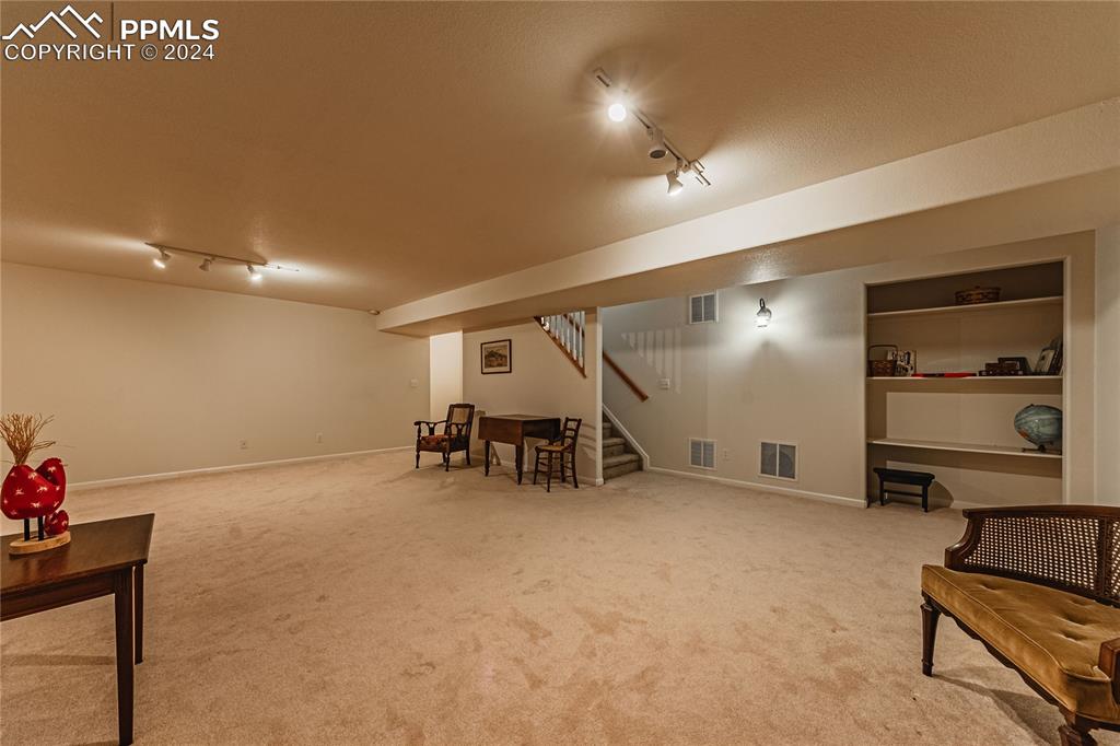 5148 Peak Villa Heights Colorado Springs, CO 80917 - Photo 30 of 45 Large family room