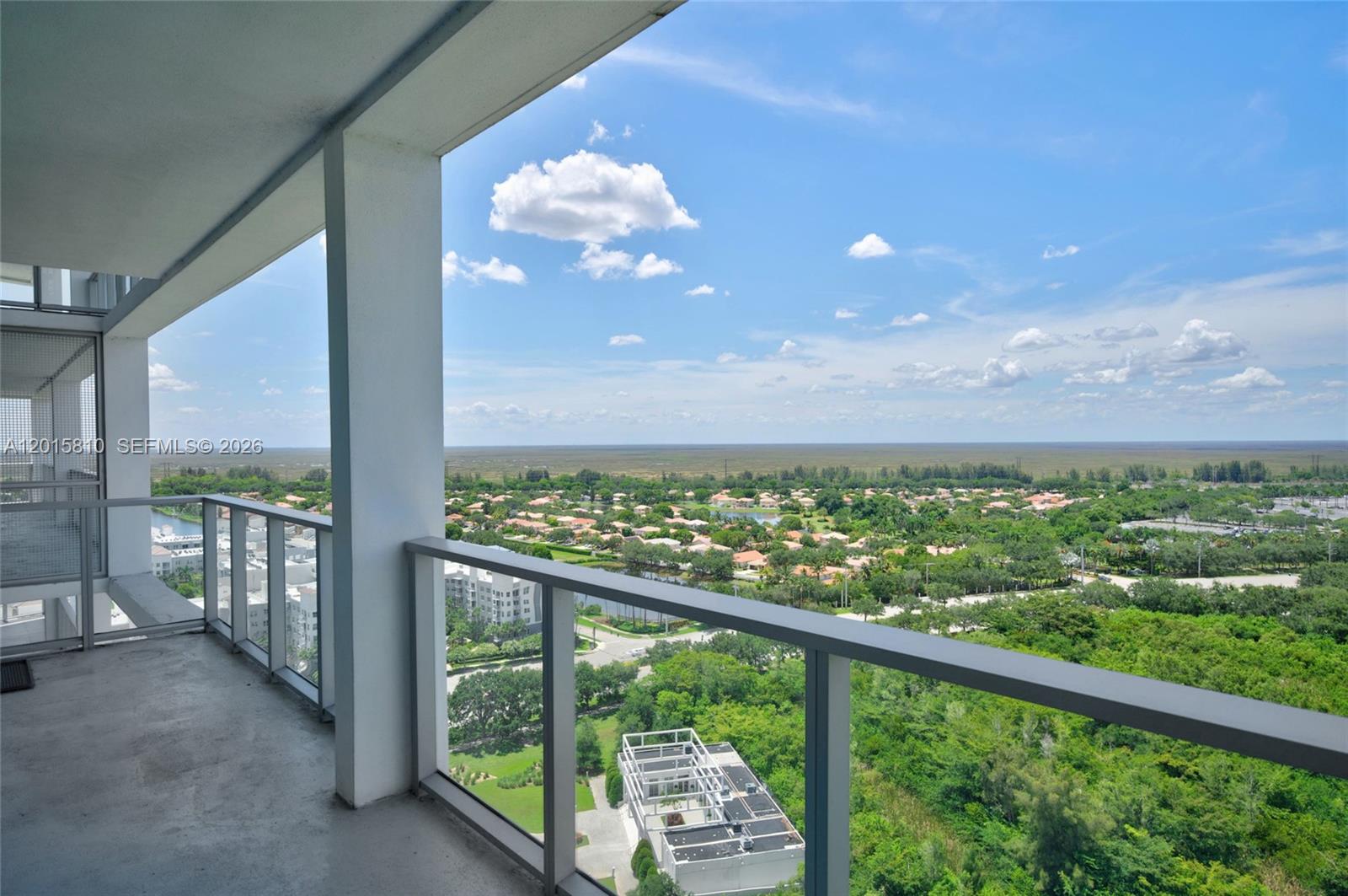 2000 Metropica Way, Unit 1902 Sunrise, FL 33323 - Photo 12 of 40 a view of a city from a balcony