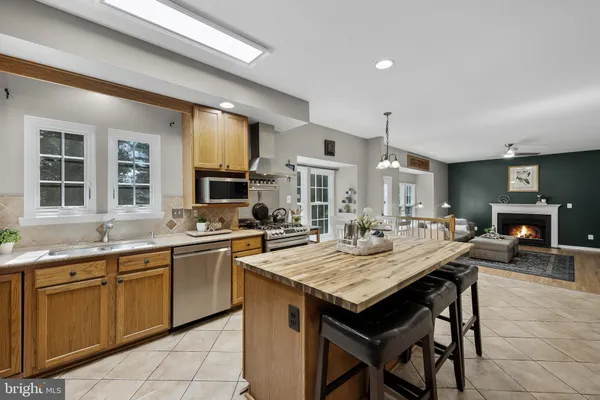 a kitchen with granite countertop a sink and counter space