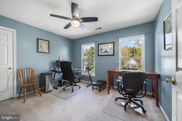 a view of a livingroom with furniture and a couch