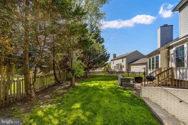 a view of outdoor space with a garden and entertaining space