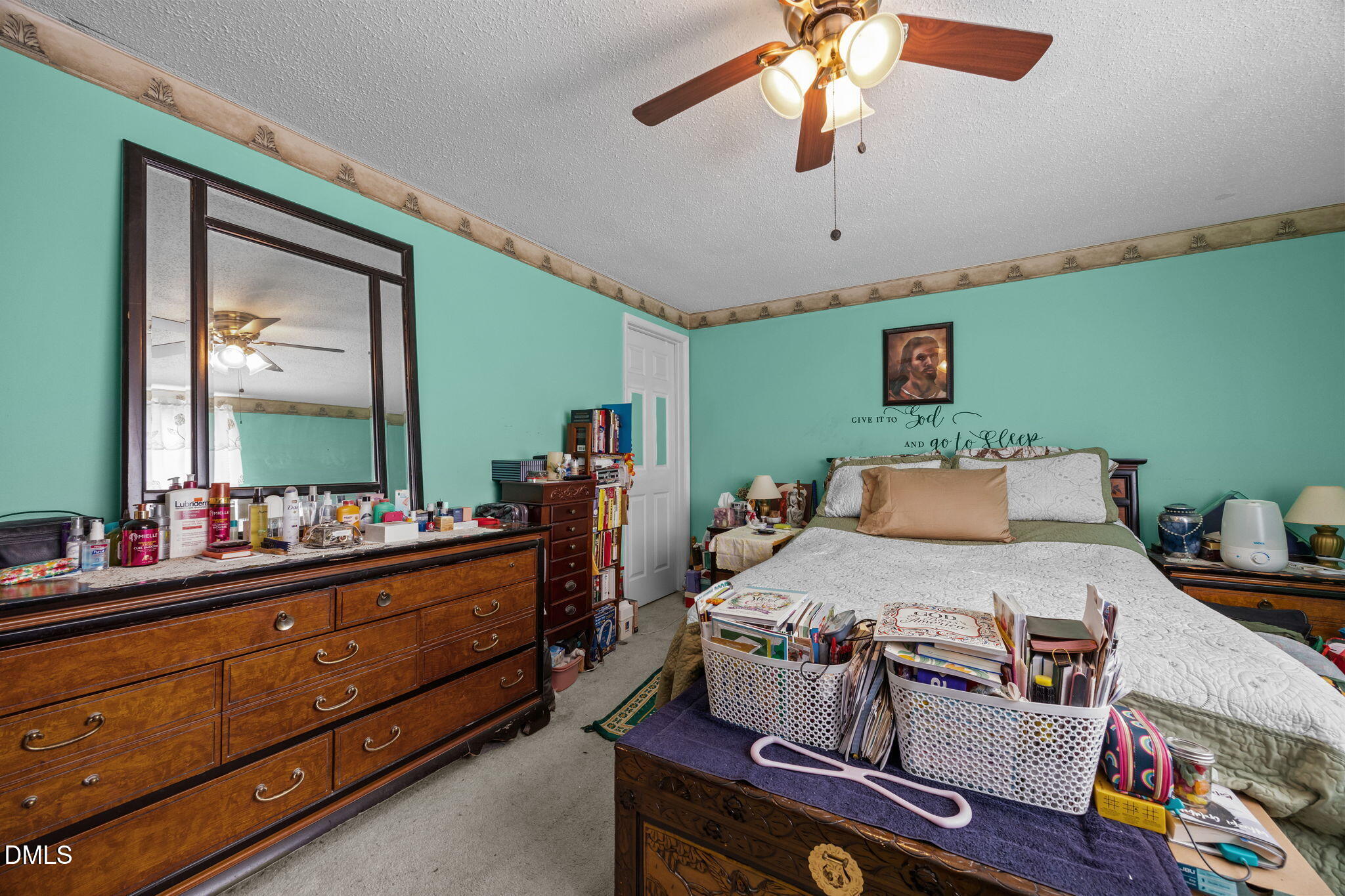 7740 Sandra Lane Raleigh, NC 27615 - Photo 14 of 36 a bed room with furniture and a window