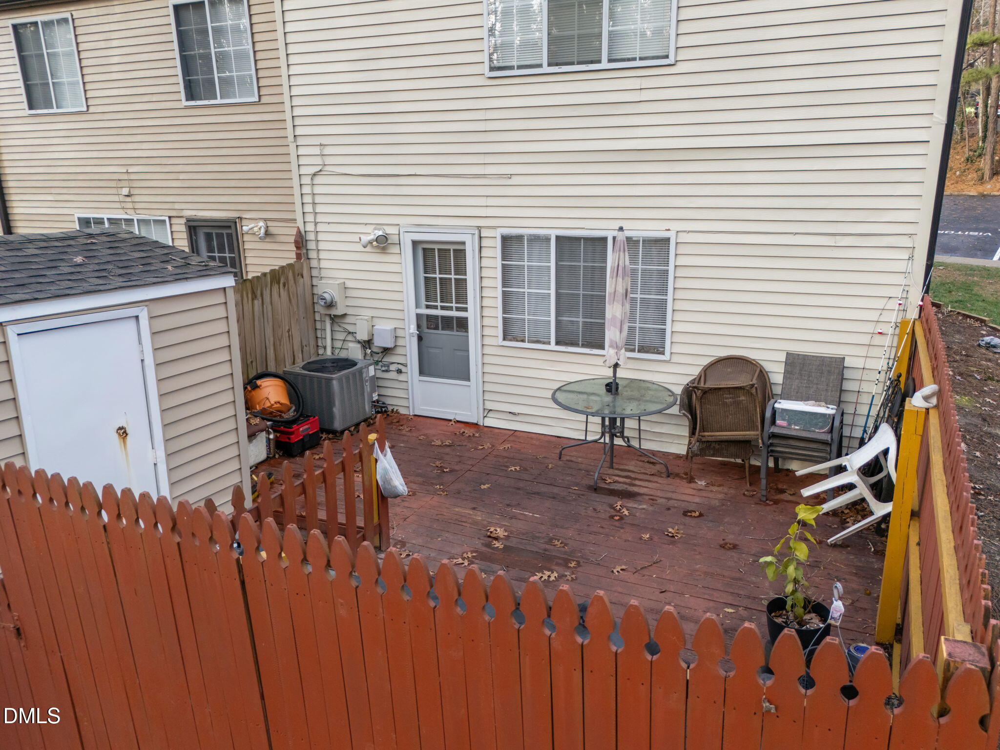 7740 Sandra Lane Raleigh, NC 27615 - Photo 25 of 36 a view of a house with a patio