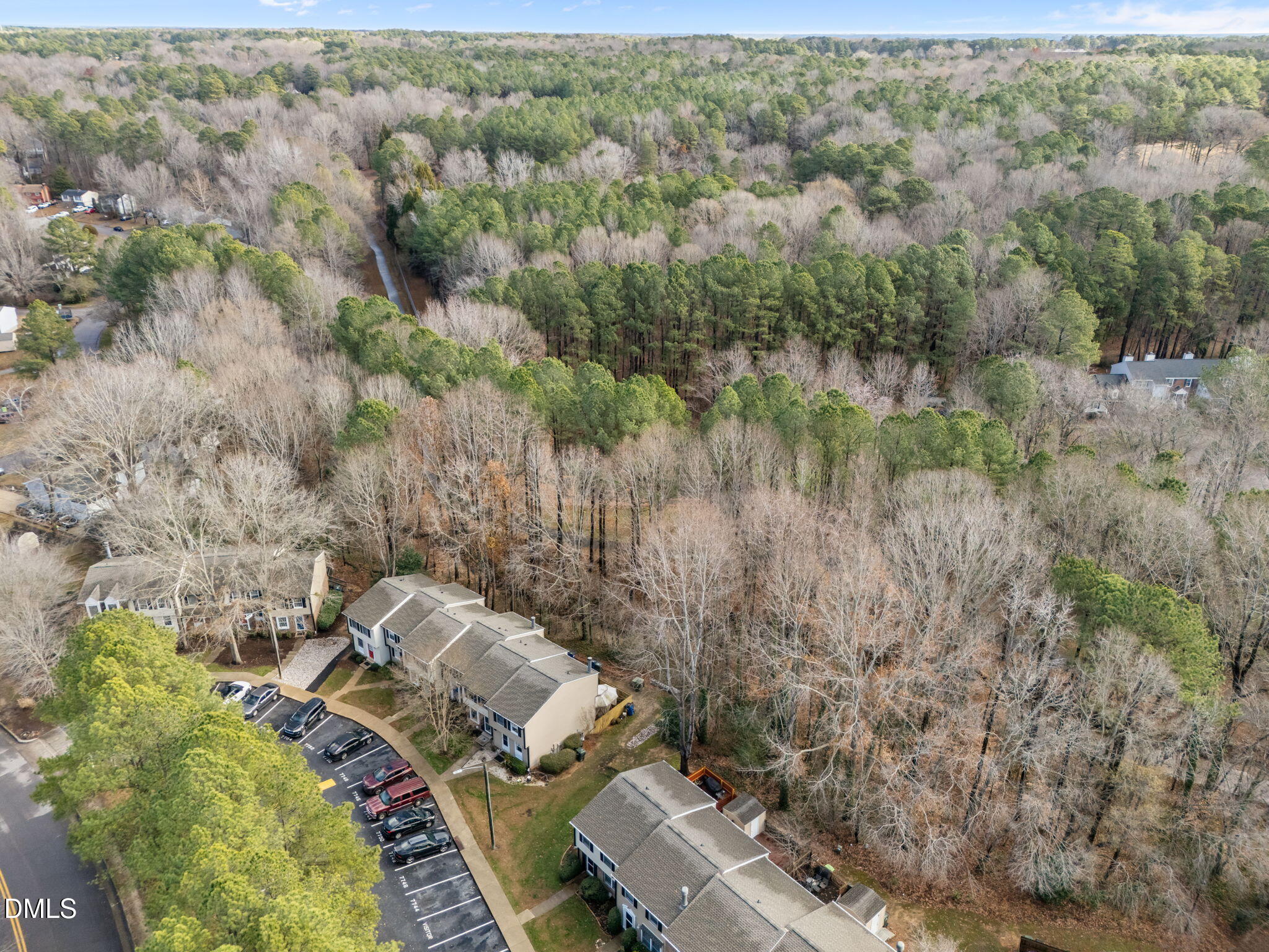 7740 Sandra Lane Raleigh, NC 27615 - Photo 27 of 36 an aerial view of a house with a yard