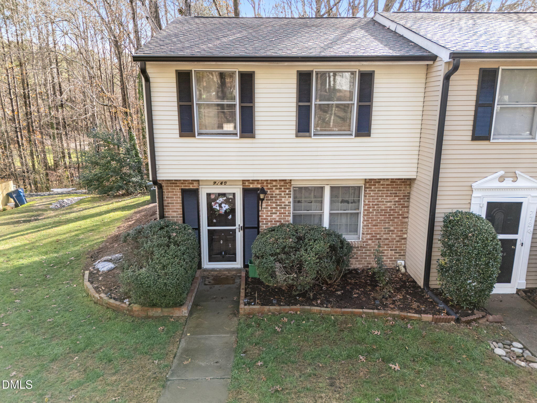 7740 Sandra Lane Raleigh, NC 27615 - Photo 35 of 36 a view of a house with backyard and garden