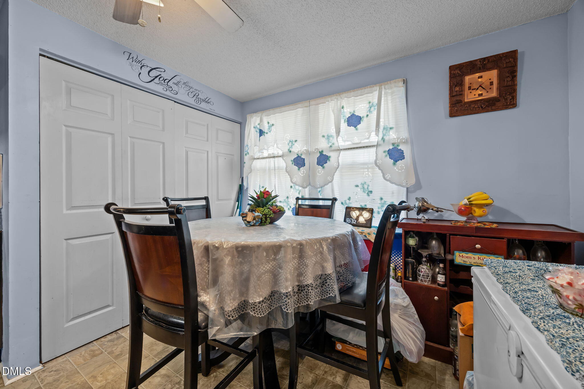 7740 Sandra Lane Raleigh, NC 27615 - Photo 6 of 36 a view of a dining room with furniture and window