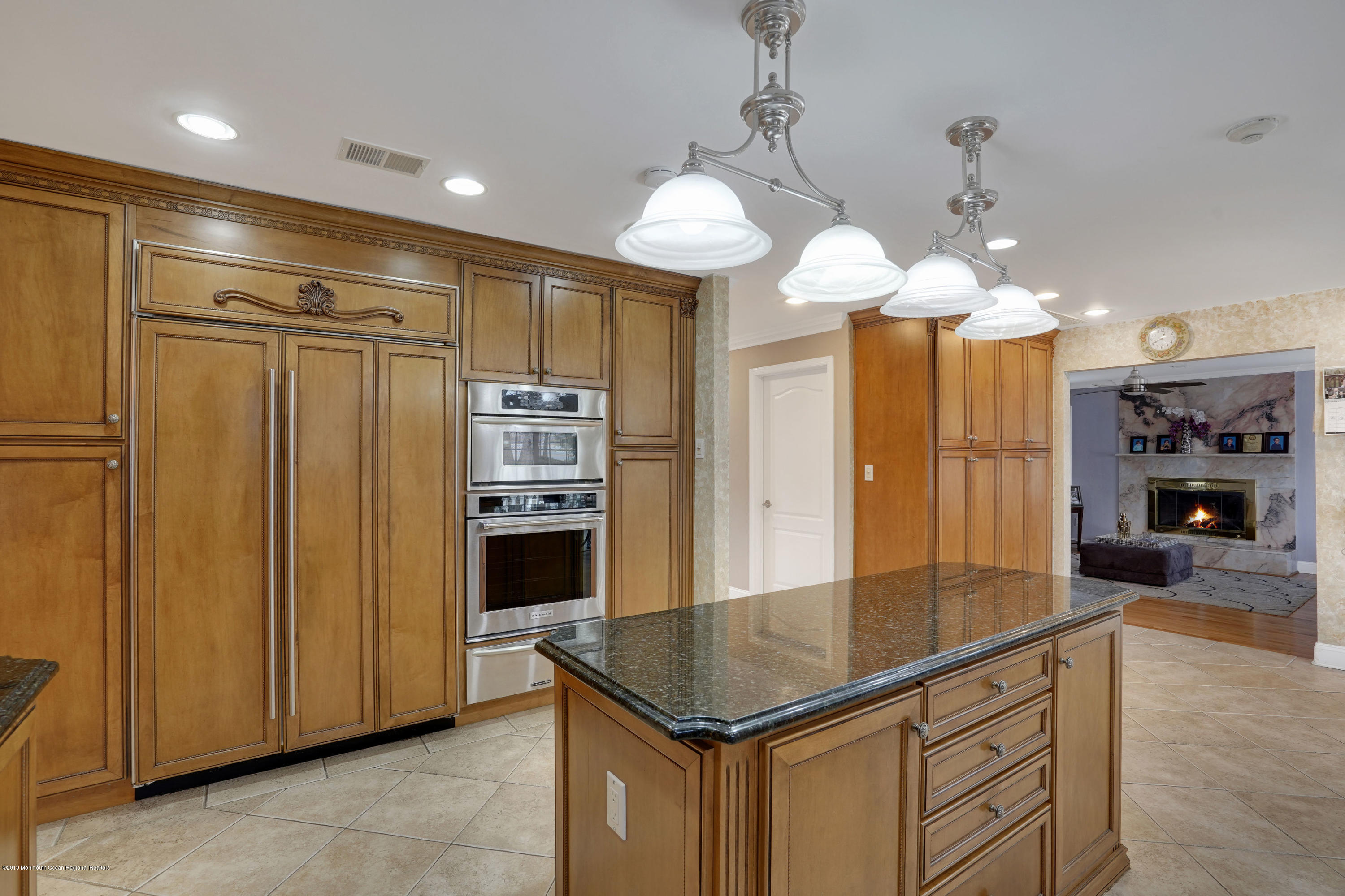 90 Georgetown Road Eatontown, NJ 07724 - Photo 10 of 18 a kitchen with stainless steel appliances granite countertop a refrigerator a sink and a stove