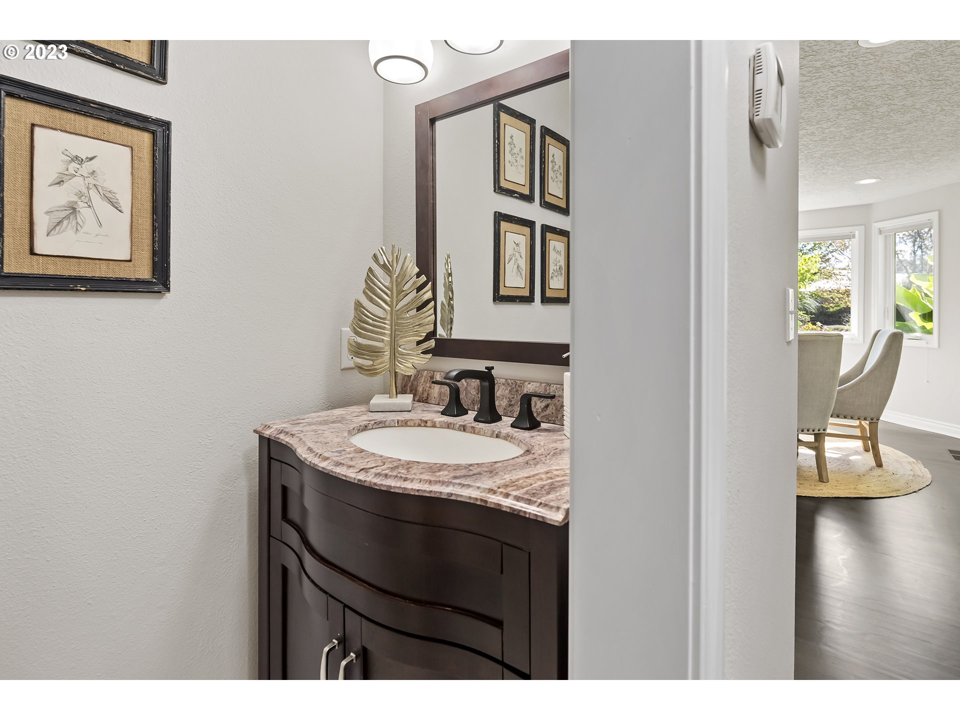 23918 Northwest Meuller Road Ridgefield, WA 98642 - Photo 14 of 32 a bathroom with a sink and a mirror