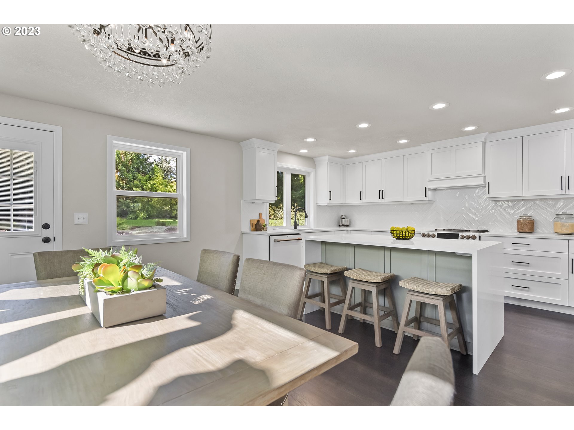23918 Northwest Meuller Road Ridgefield, WA 98642 - Photo 4 of 32 a kitchen with a dining table chairs and window