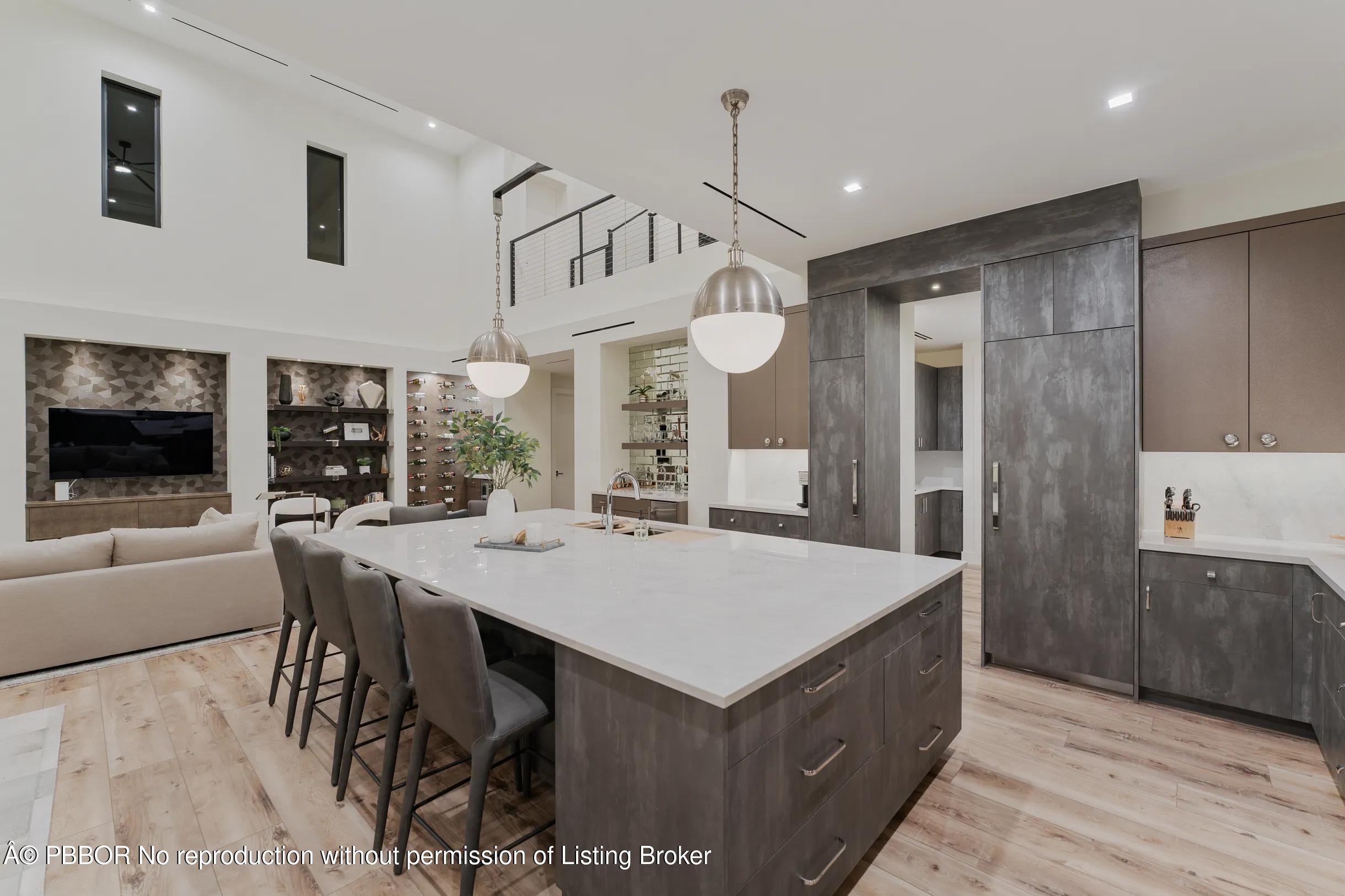 Undisclosed Address West Palm Beach, FL 33407 - Photo 12 of 57 a large kitchen with a table and chairs