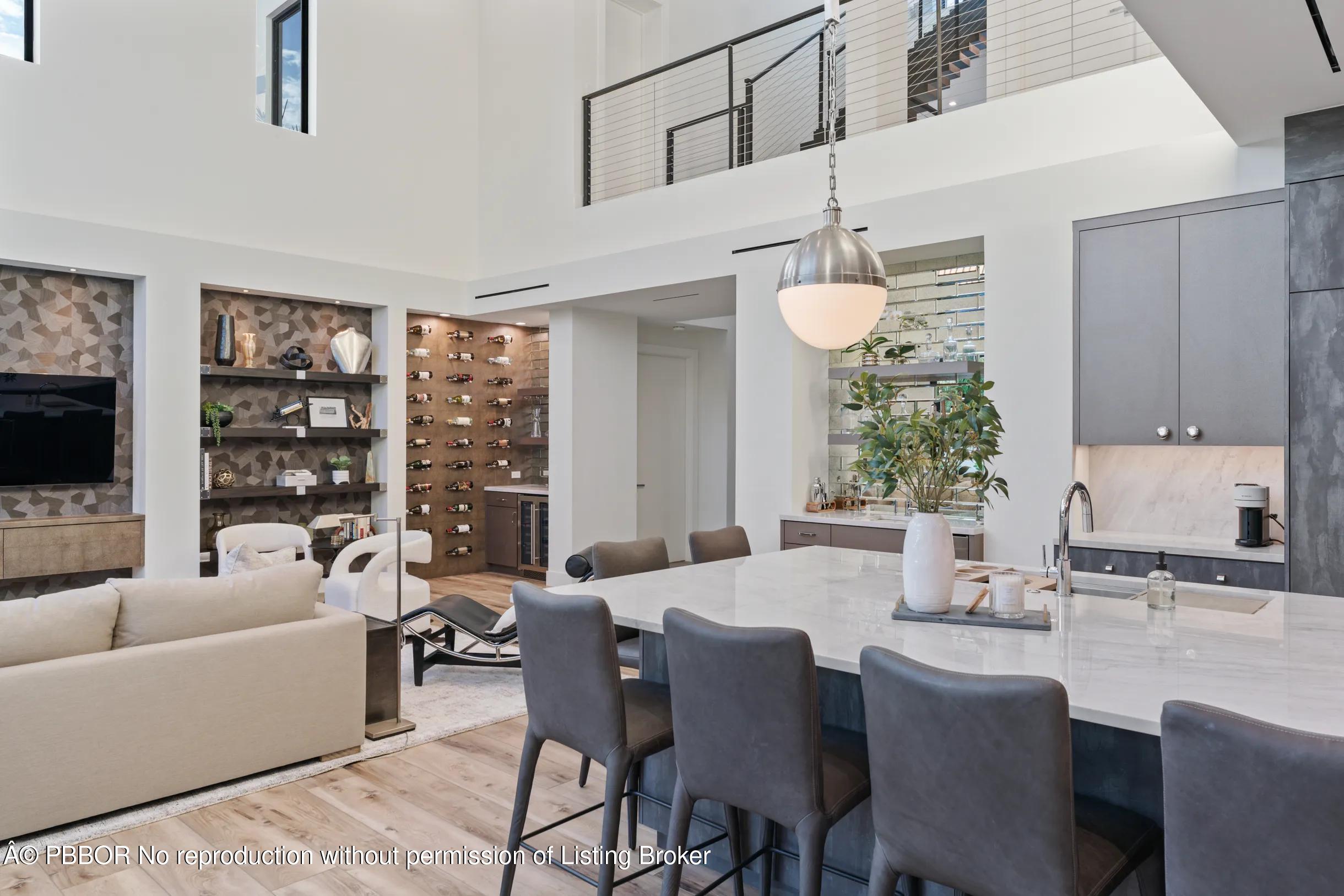 Undisclosed Address West Palm Beach, FL 33407 - Photo 14 of 57 a living room with furniture a chandelier and a dining table