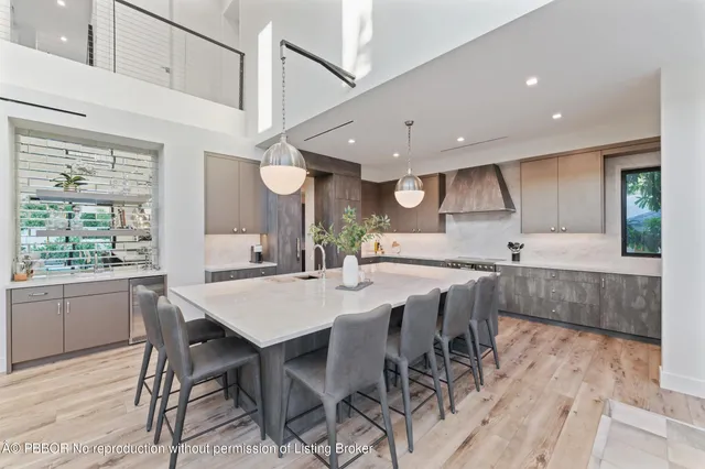 a kitchen with a sink a counter top space and cabinets
