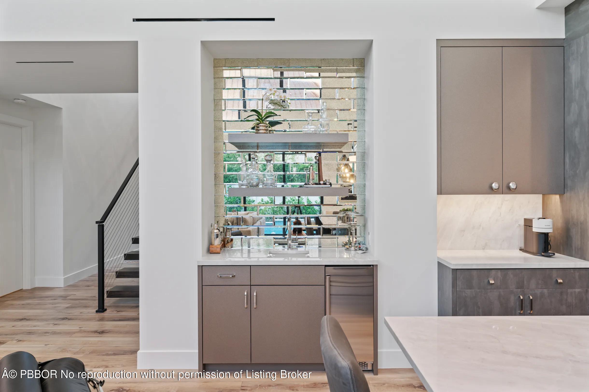 Undisclosed Address West Palm Beach, FL 33407 - Photo 17 of 57 a kitchen with a sink a counter top space and cabinets