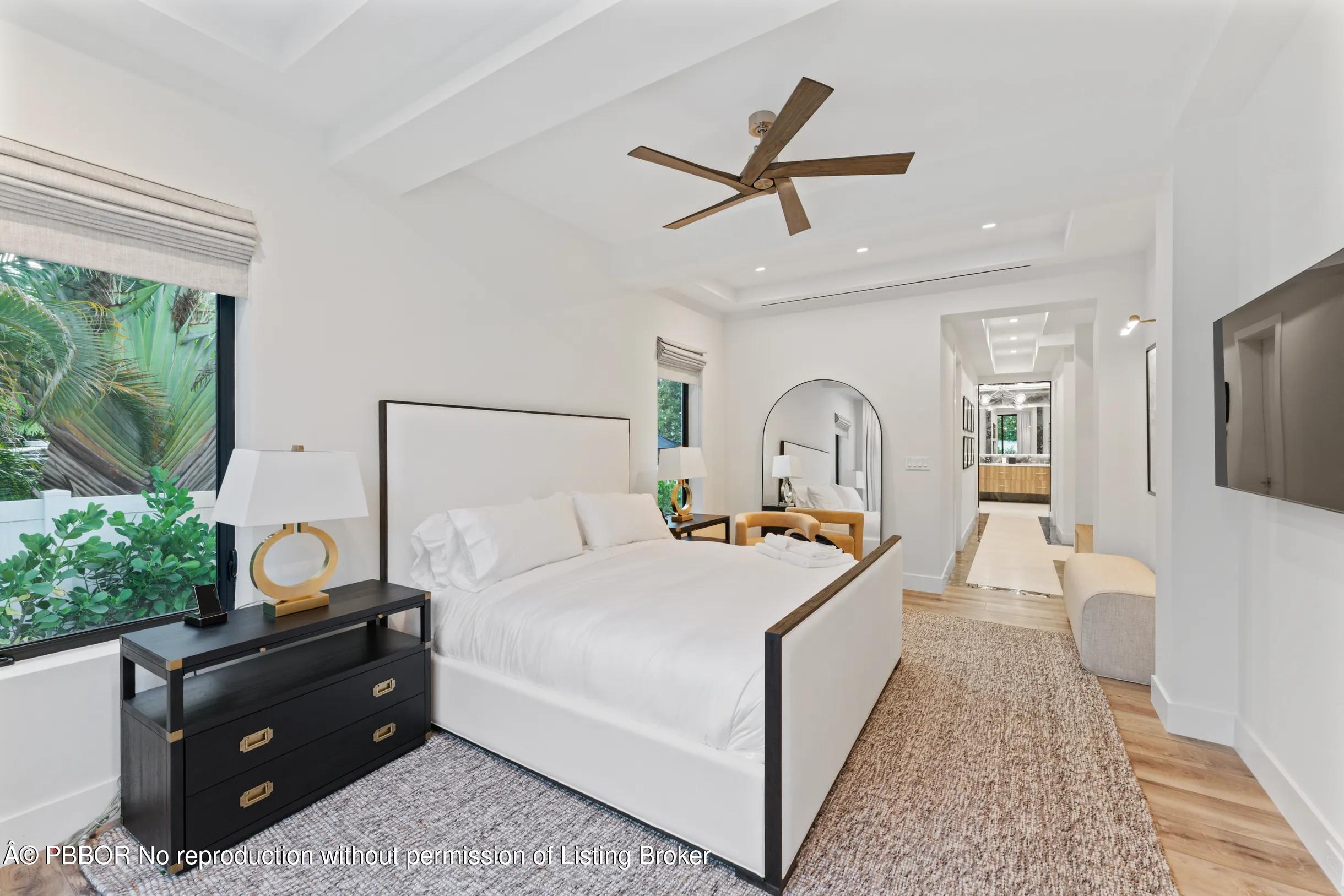 Undisclosed Address West Palm Beach, FL 33407 - Photo 18 of 57 a bedroom with a large bed and a window