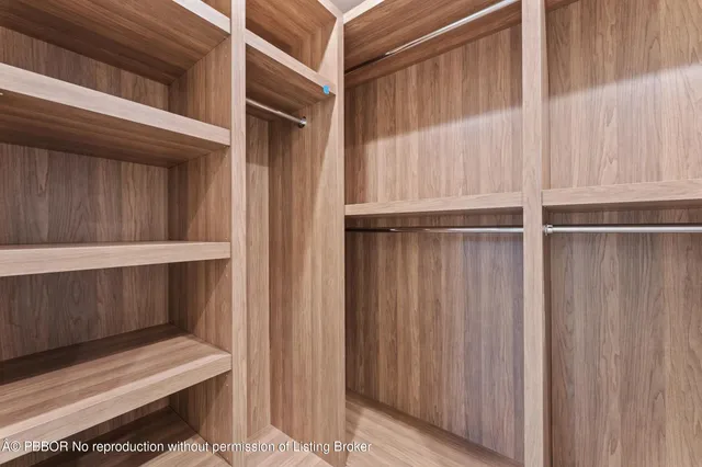 a bathroom with a tub shower and sink