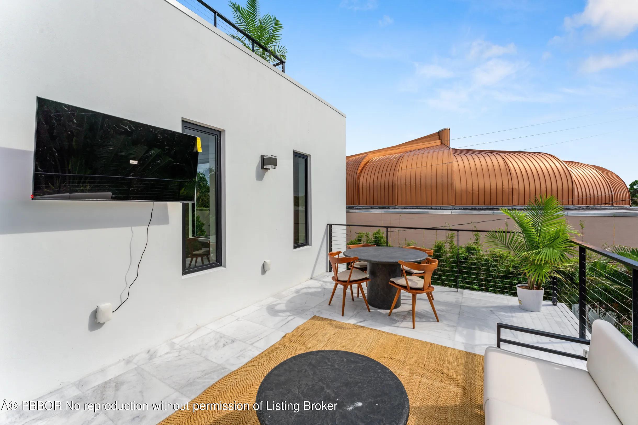 Undisclosed Address West Palm Beach, FL 33407 - Photo 44 of 57 a living room with furniture and a flat screen tv