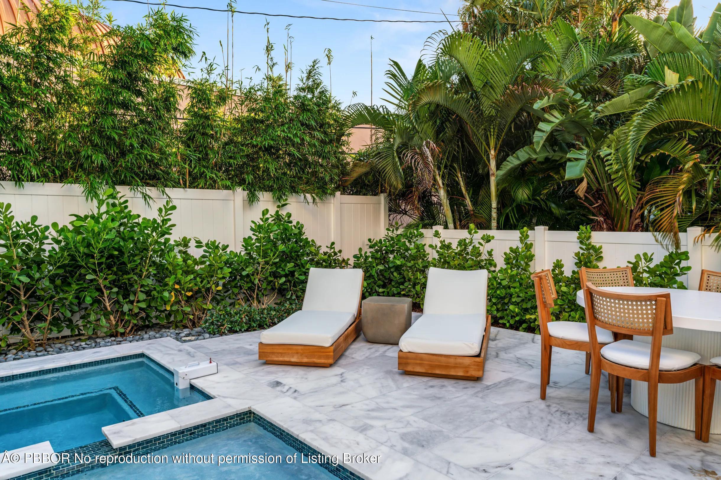 Undisclosed Address West Palm Beach, FL 33407 - Photo 56 of 57 a view of backyard with swimming pool and seating area