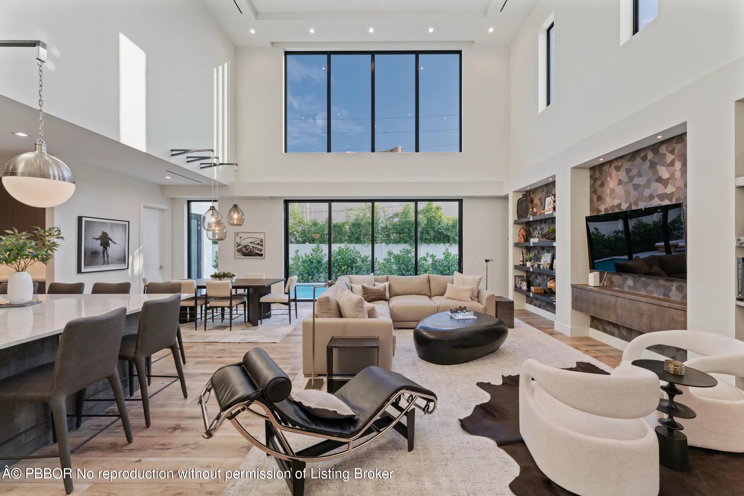 Undisclosed Address West Palm Beach, FL 33407 - Photo 8 of 57 a living room with furniture and a flat screen tv