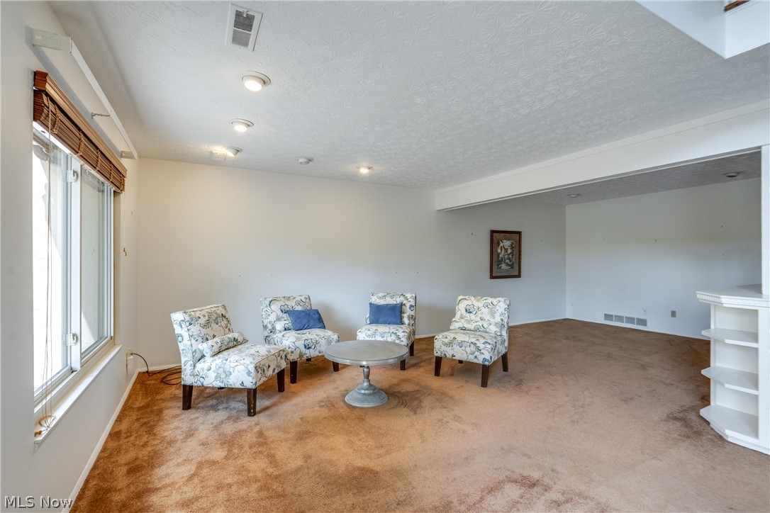 3388 South Smith Road Fairlawn, OH 44333 - Photo 11 of 31 A view to the sitting area/ corner office/ television cozy area.