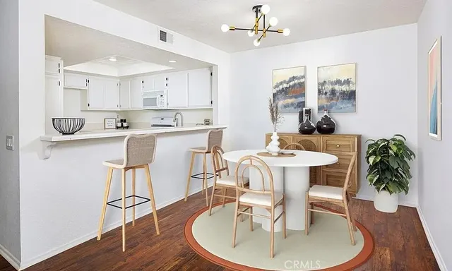 a view of storage and utility room with washer and dryer