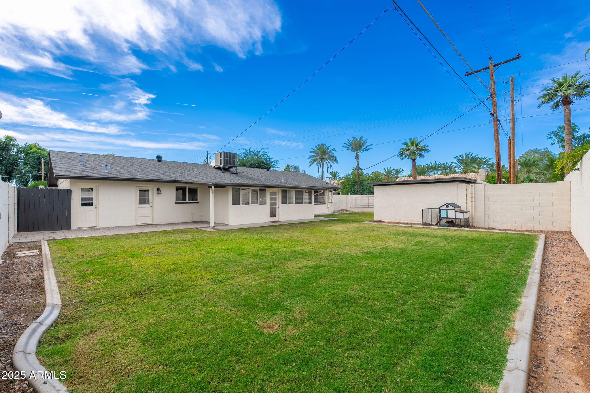 3002 East Whitton Avenue Phoenix, AZ 85016 - Photo 14 of 32 a view of a house with a backyard