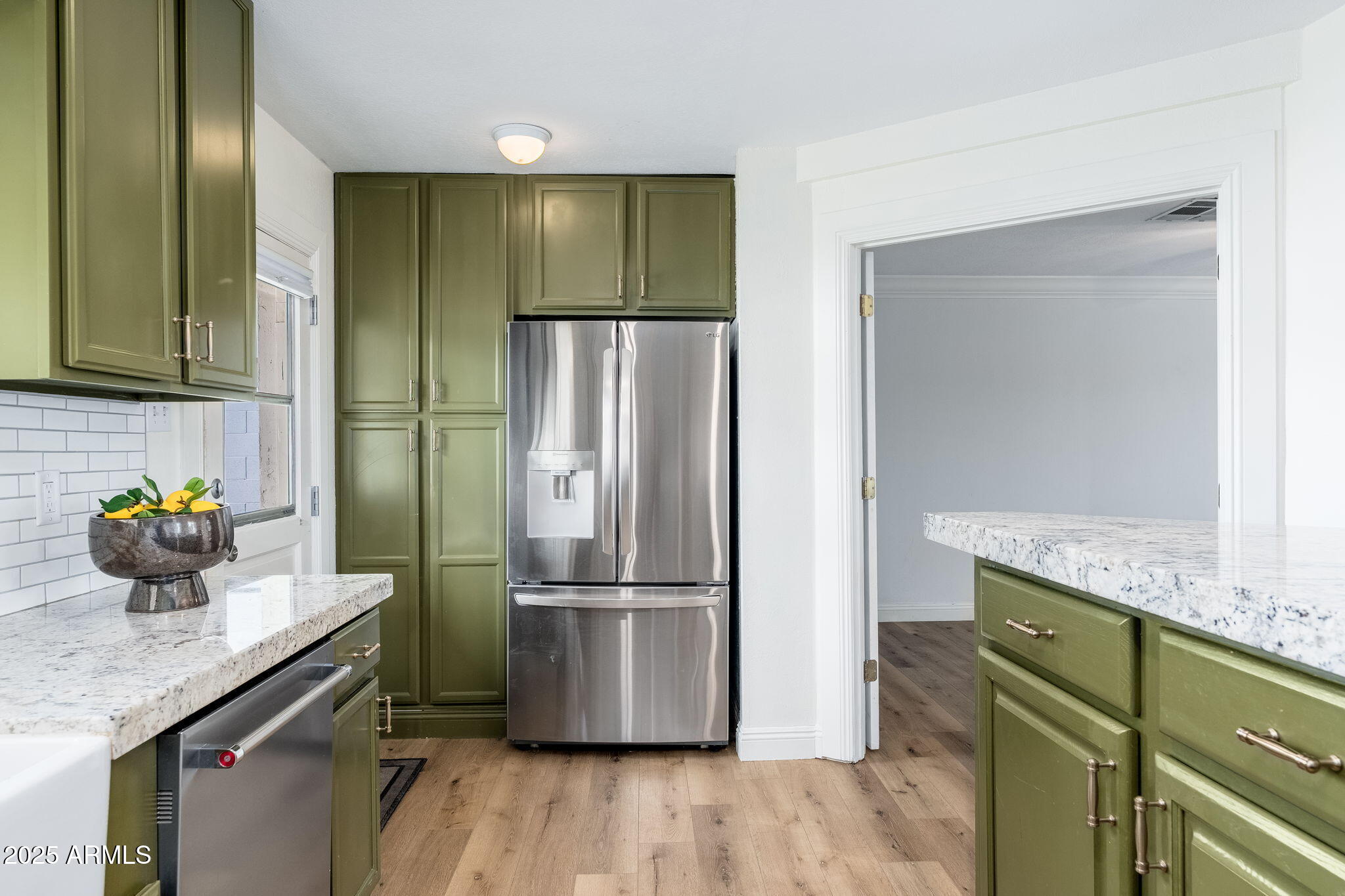 3002 East Whitton Avenue Phoenix, AZ 85016 - Photo 19 of 32 a kitchen with stainless steel appliances granite countertop a refrigerator and a sink