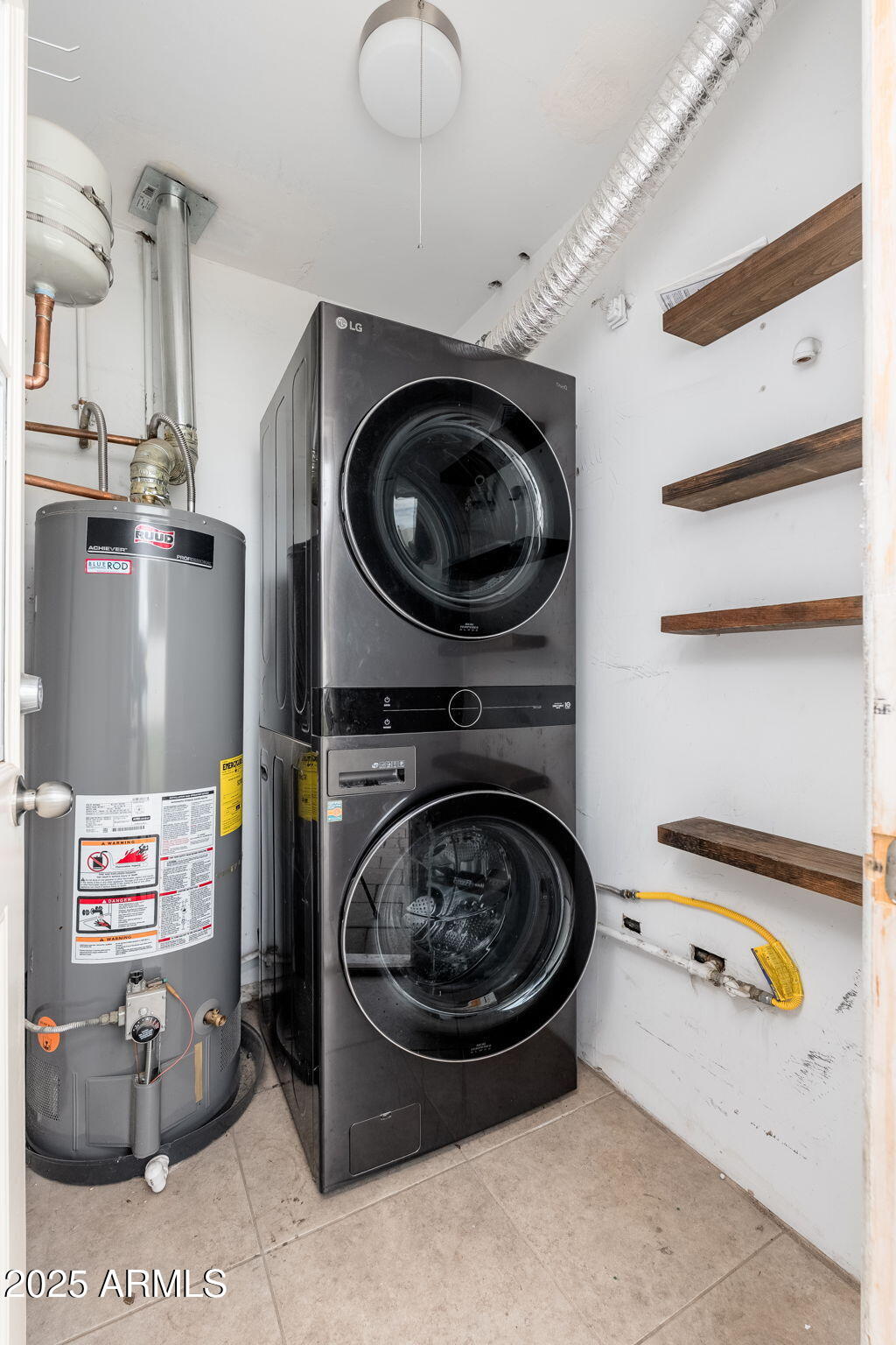 3002 East Whitton Avenue Phoenix, AZ 85016 - Photo 25 of 32 a utility room with sink dryer and washer