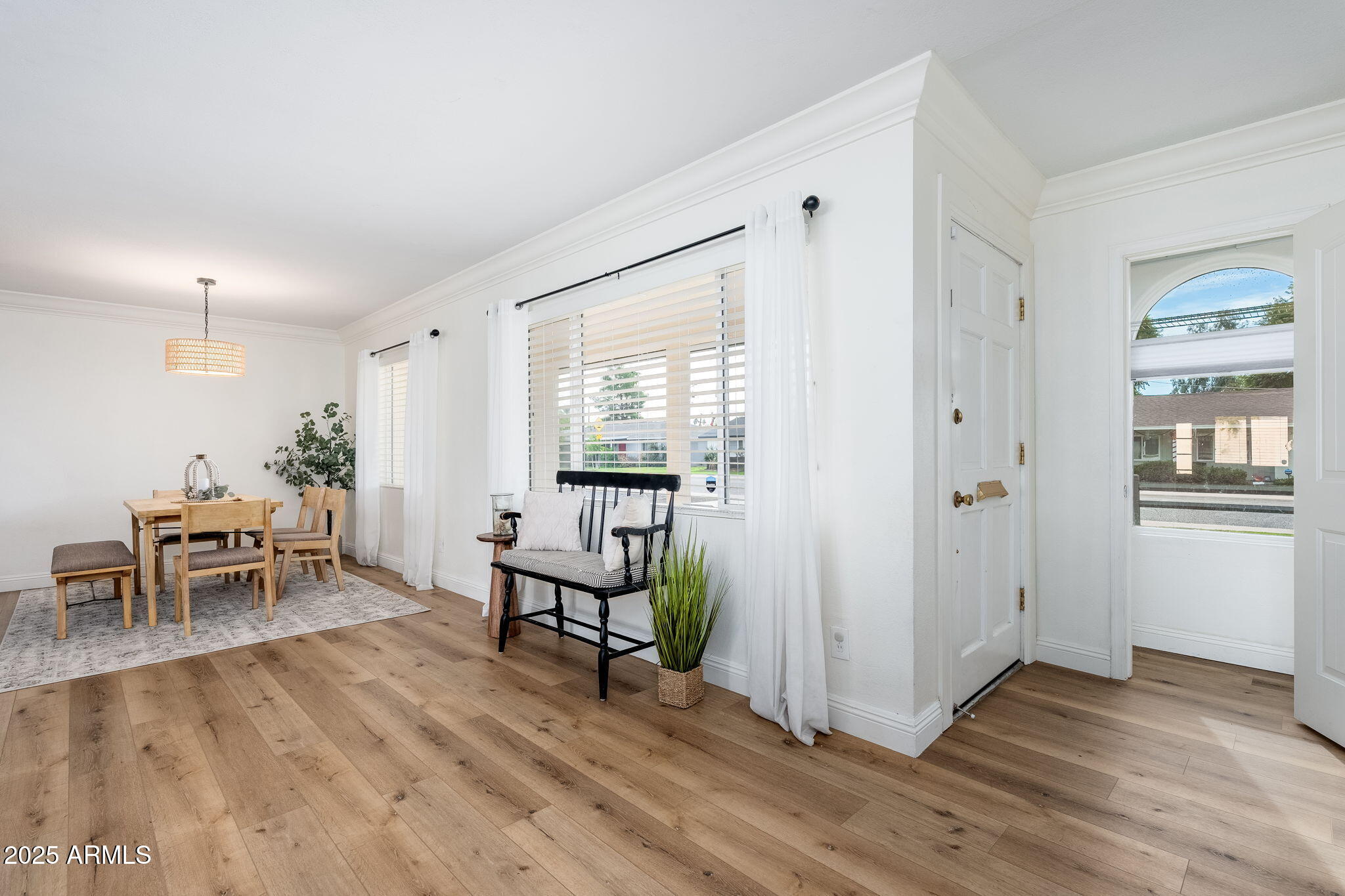 3002 East Whitton Avenue Phoenix, AZ 85016 - Photo 2 of 32 a view of a livingroom with furniture and a window
