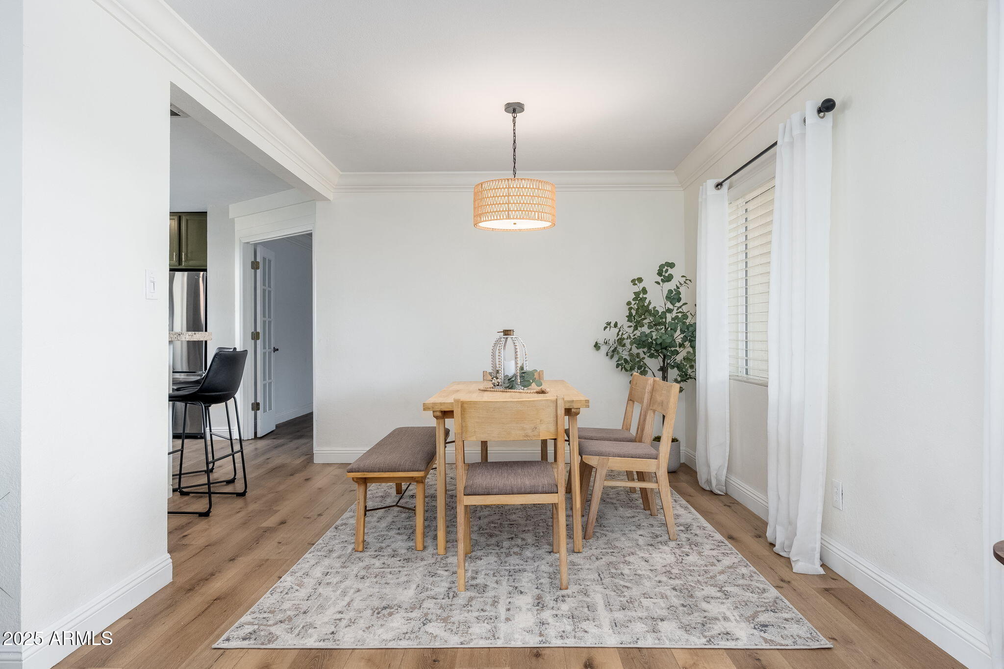 3002 East Whitton Avenue Phoenix, AZ 85016 - Photo 4 of 32 a dining room with a table and chairs