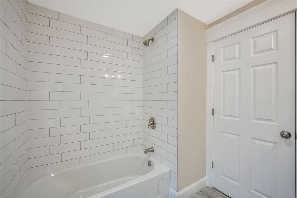 16 Water Street, Unit D Freetown, MA 02702 - Photo 20 of 24 a bathroom with a bathtub