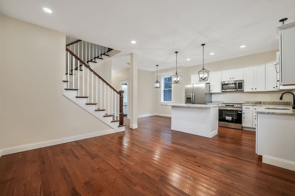 16 Water Street, Unit D Freetown, MA 02702 - Photo 10 of 24 a view of kitchen with wooden floor and electronic appliances