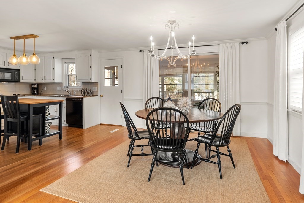 35 Fells Road Wellesley, MA 02482 - Photo 7 of 13 a view of a dining room with furniture and chandelier