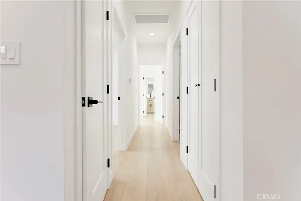 a view of a bathroom from the hallway