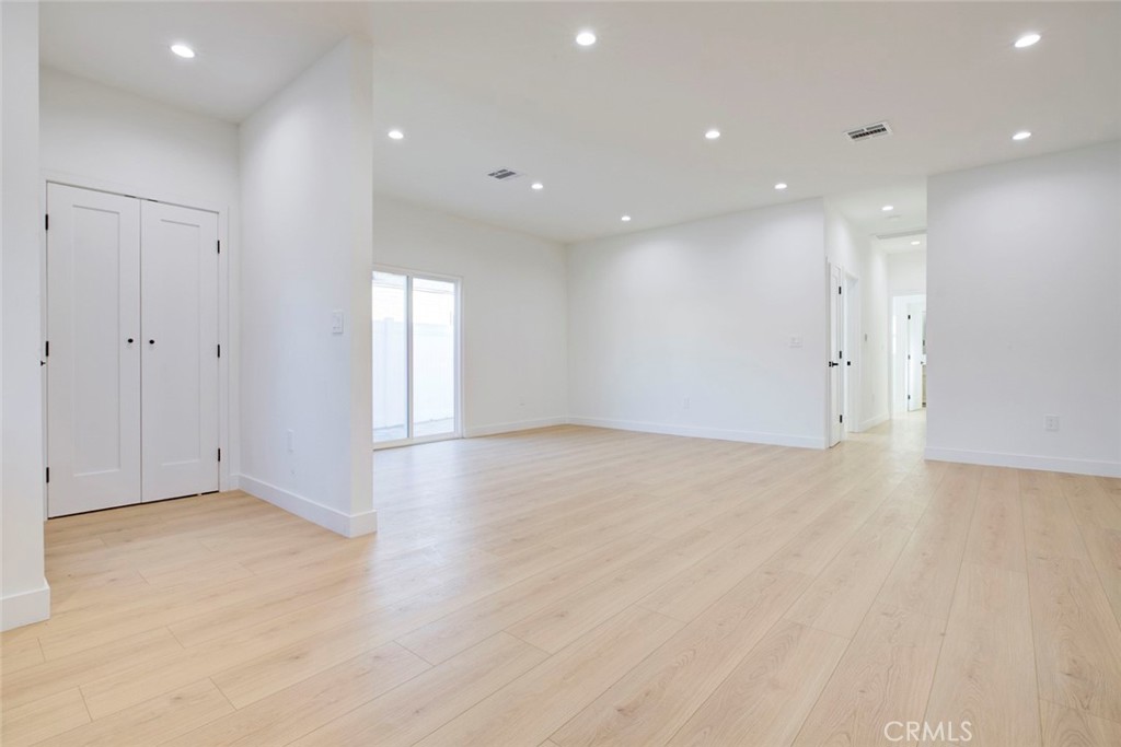 2240 North Keystone Street Burbank, CA 91504 - Photo 8 of 24 a view of an empty room with wooden floor