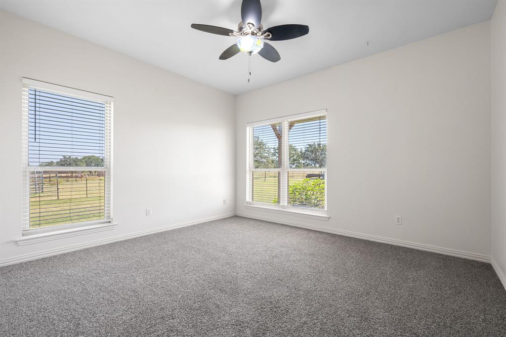 510 South Swanson Road Mineral Wells, TX 76067 - Photo 20 of 38 a view of an empty room with a window