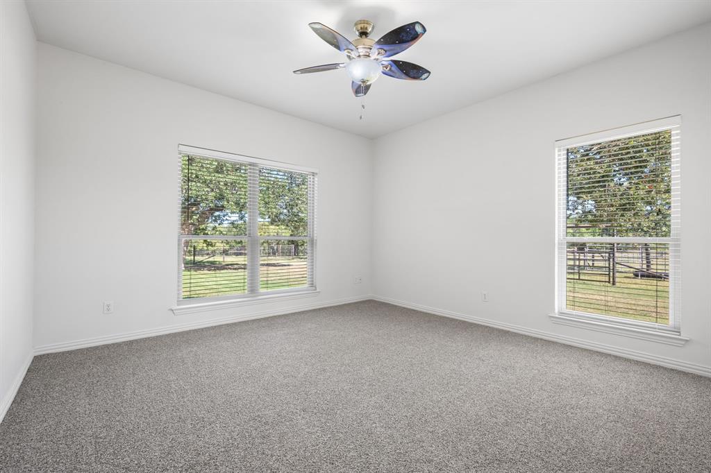 510 South Swanson Road Mineral Wells, TX 76067 - Photo 23 of 38 a view of an empty room with a window