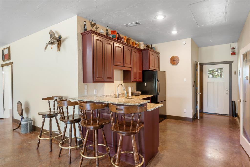 510 South Swanson Road Mineral Wells, TX 76067 - Photo 30 of 38 Kitchen in one bedroom apartment or wet bar for entertaining in game room!