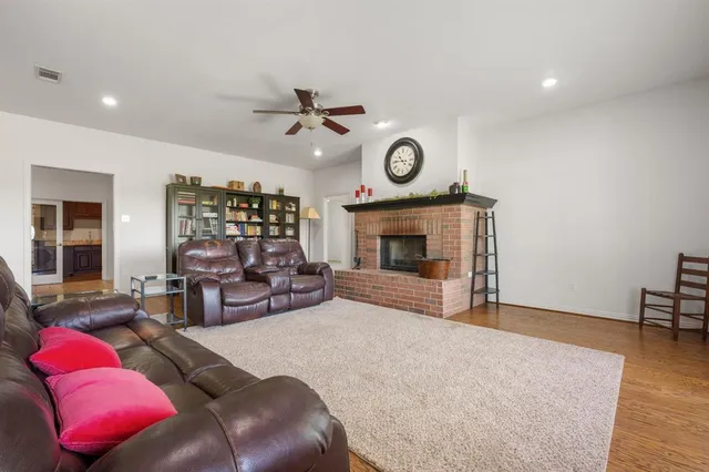 a kitchen with stainless steel appliances a stove a refrigerator and a sink