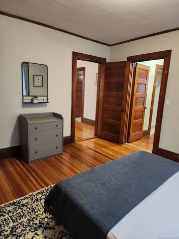 a view of a bathroom from the hallway