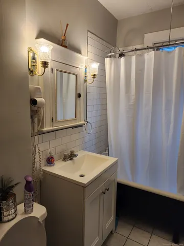 a bathroom with a sink and a bathtub