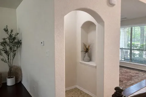 a bedroom with a bed and a cabinets