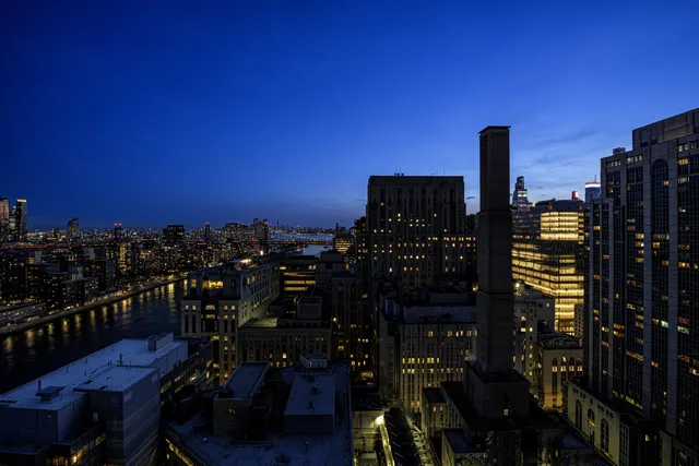 a view of a balcony with chairs