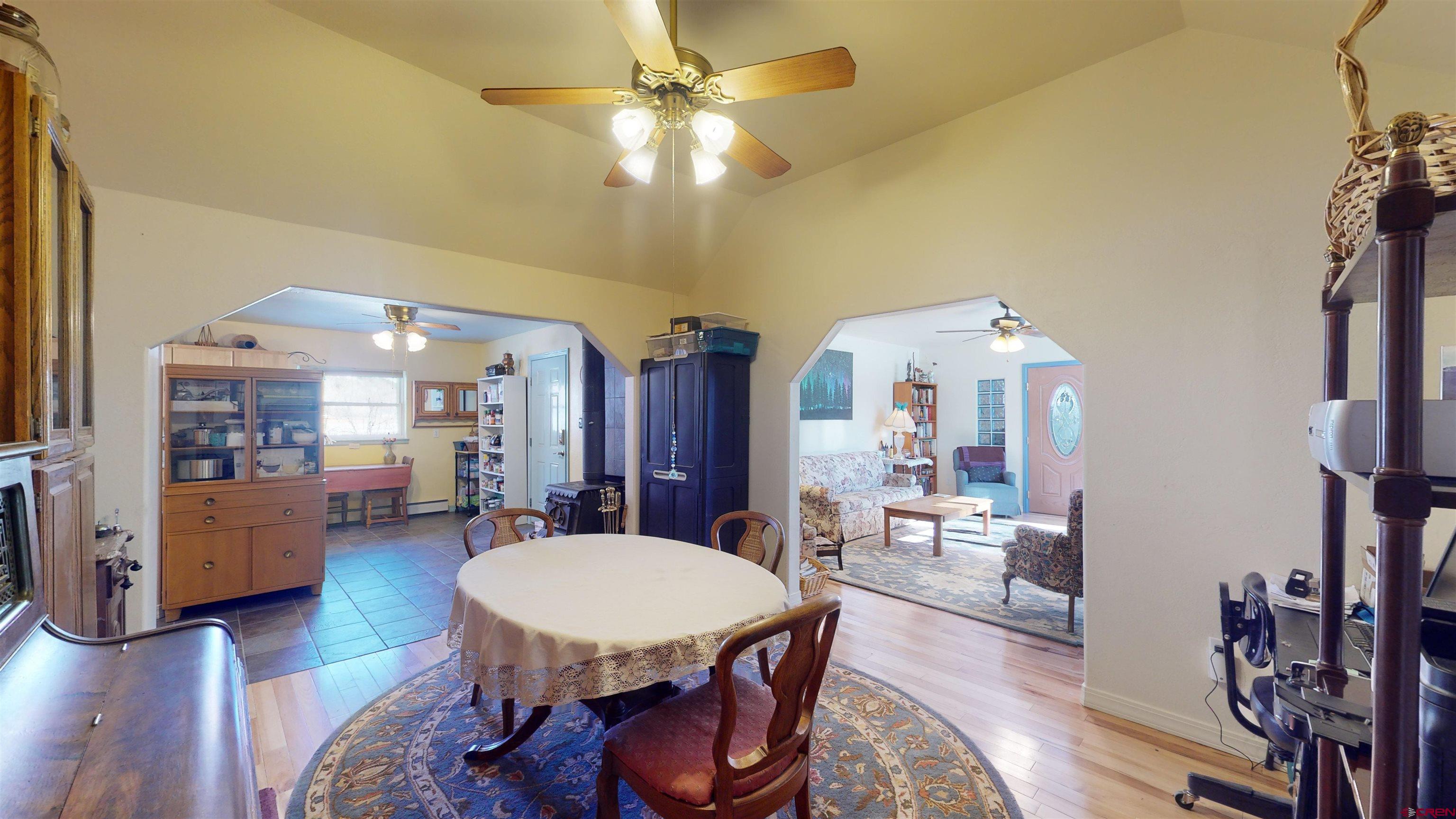 16459 Grange Road Paonia, CO 81428 - Photo 11 of 35 a view of a dining room with furniture and wooden floor