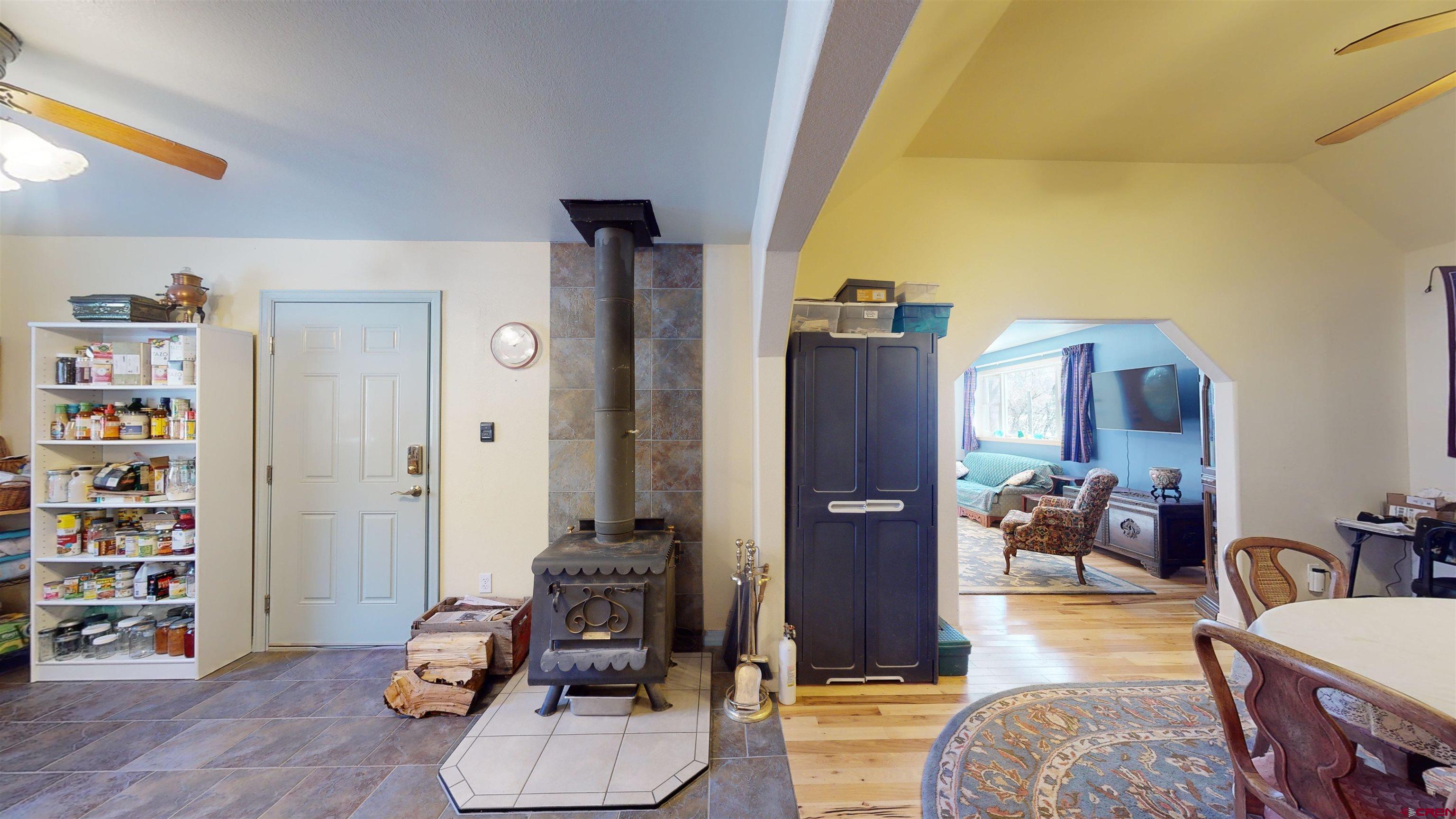 16459 Grange Road Paonia, CO 81428 - Photo 13 of 35 a bedroom with furniture and a book shelf