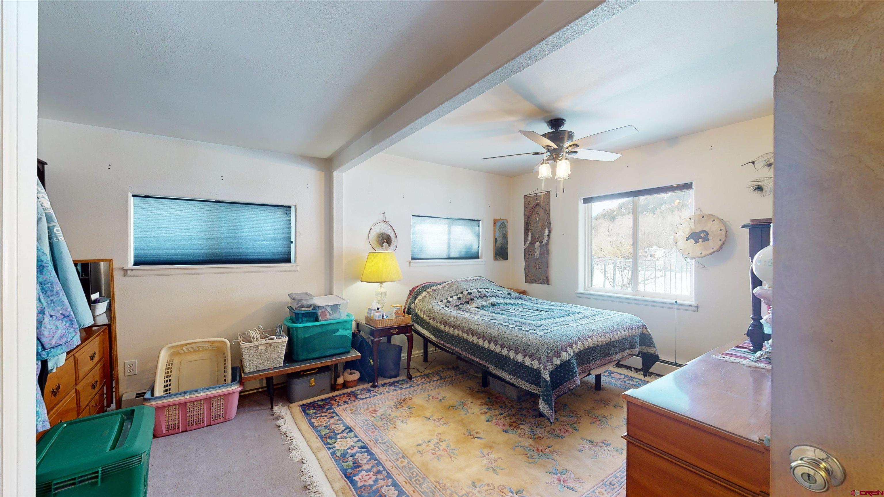 16459 Grange Road Paonia, CO 81428 - Photo 17 of 35 a living room with furniture and a flat screen tv