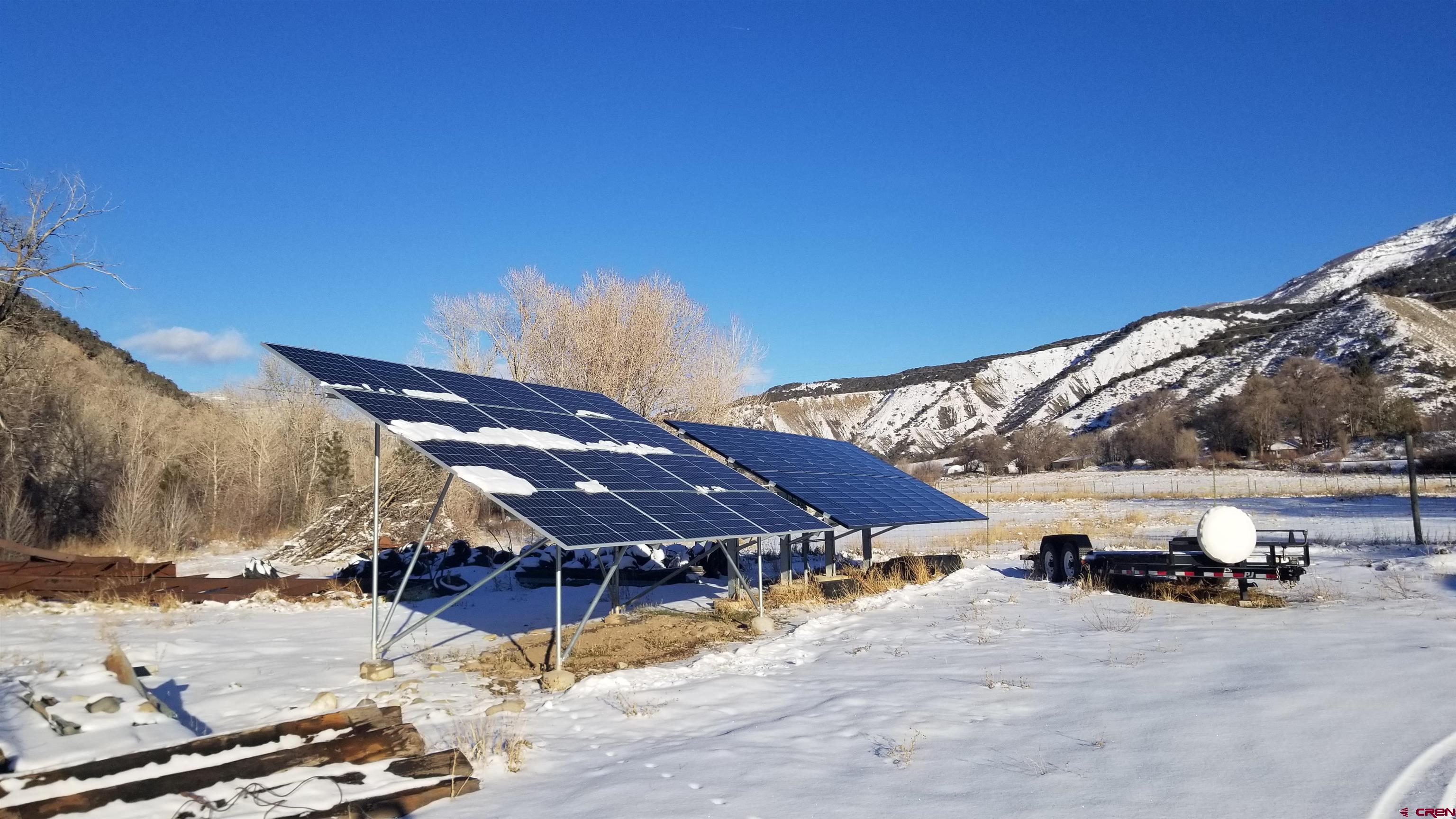 16459 Grange Road Paonia, CO 81428 - Photo 30 of 35 a view of a house with a yard