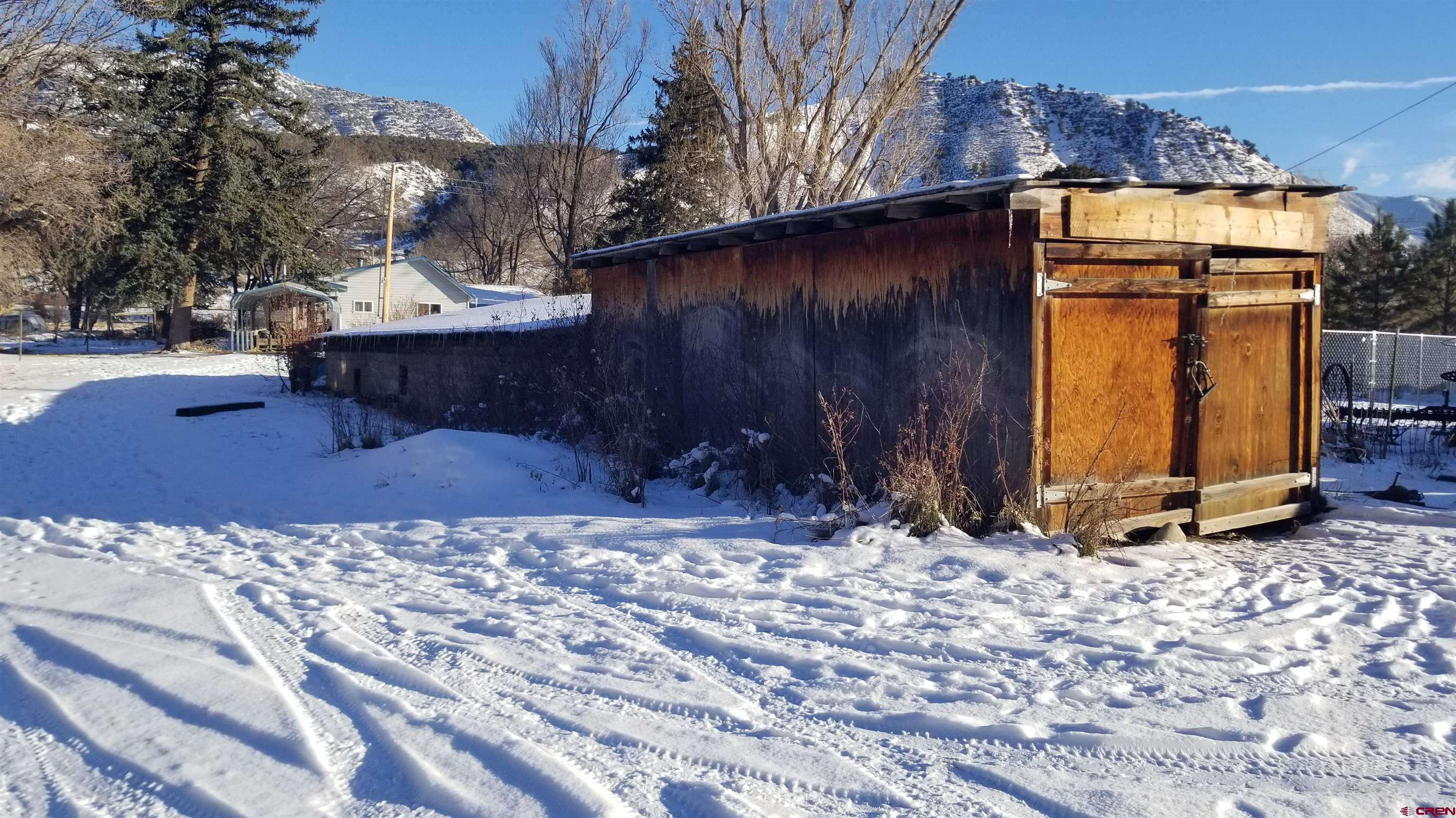 16459 Grange Road Paonia, CO 81428 - Photo 32 of 35 a view of a house with snow on the floor