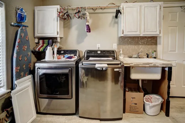 a kitchen with a stove and a refrigerator