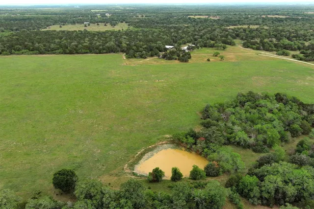a view of a lake with a city